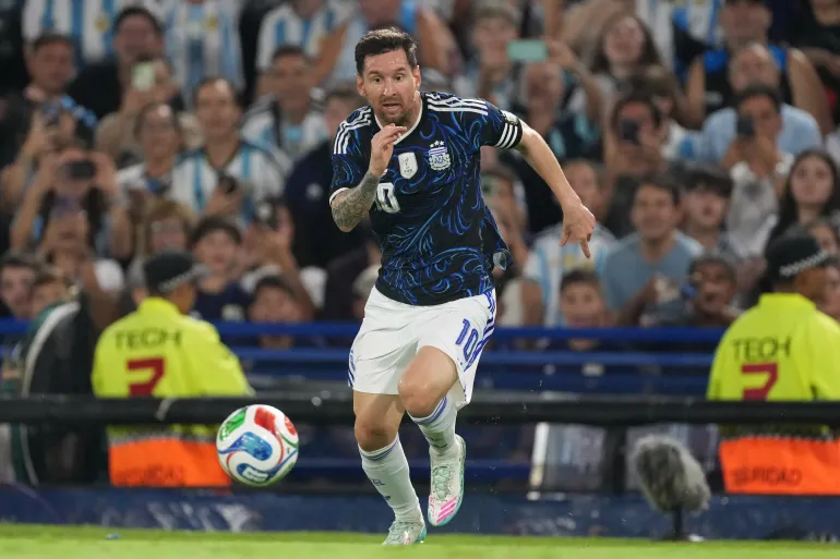 FILE - Argentina's Lionel Messi dribbles during a friendly soccer match against Zambia in Buenos Aires, Argentina, Tuesday, March 31, 2026.