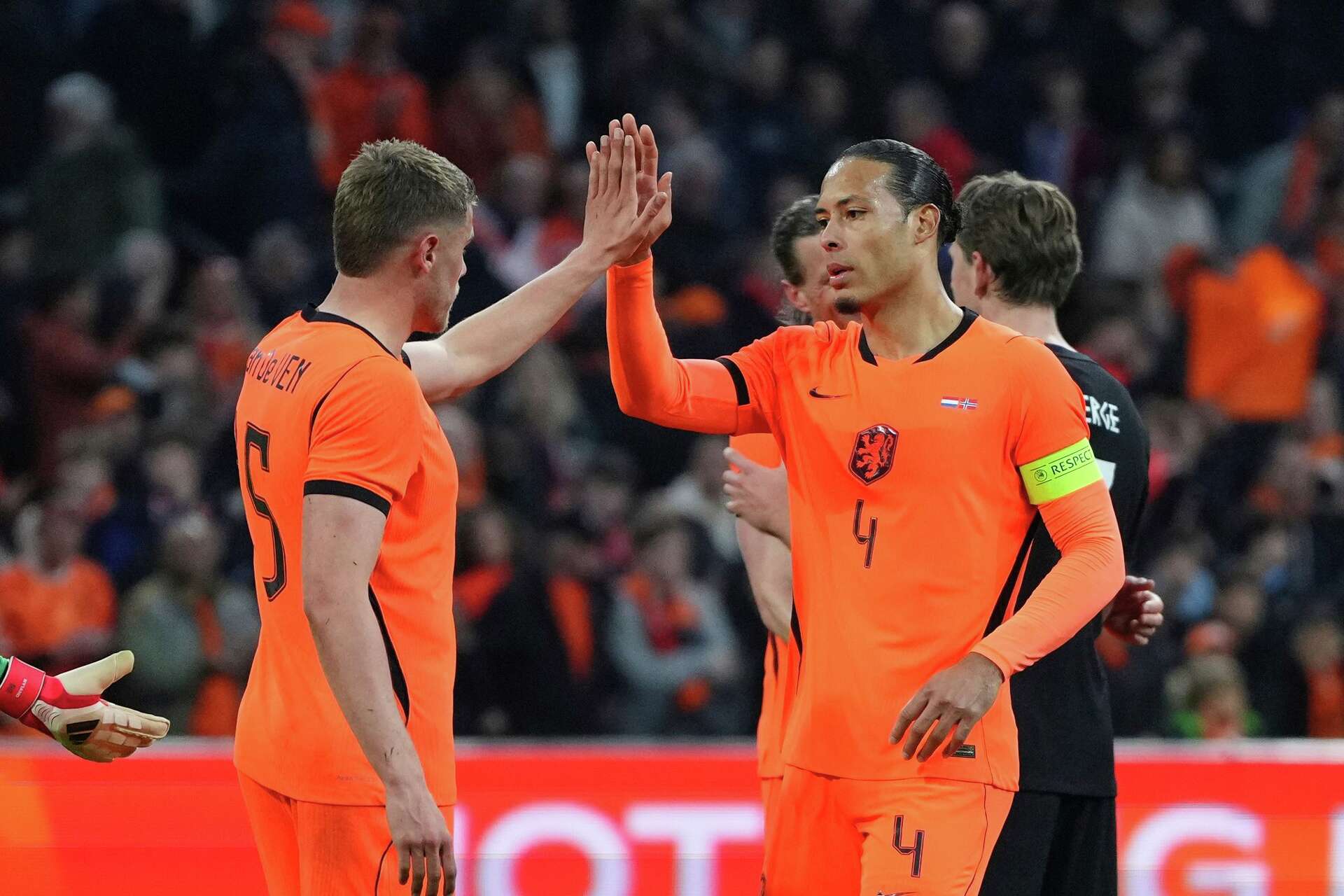 Netherlands' Virgil van Dijk, right, and Natan Ake celebrate after the international friendly soccer match between the Netherlands and Norwa